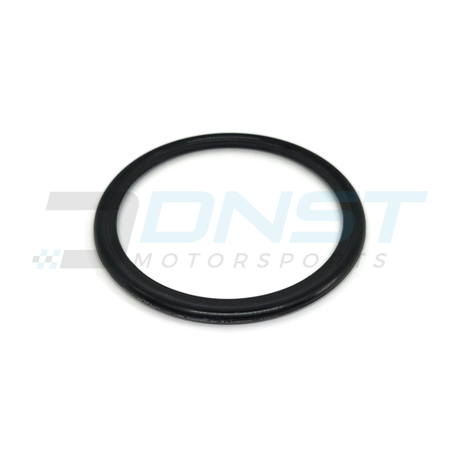 a round rubber oil filter gasket on a white background with DNST Motorsports watermark