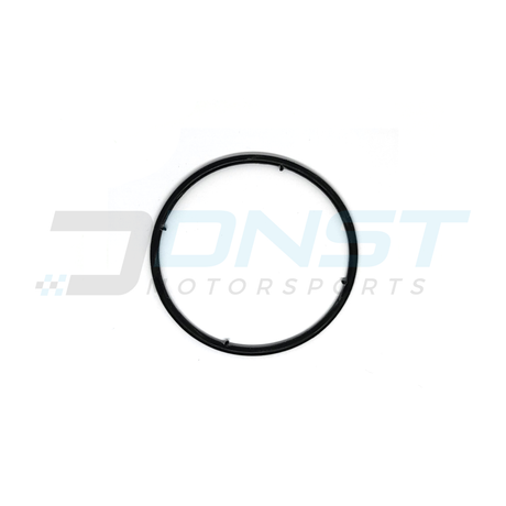 a round rubber gasket with 4 rubber prongs on a white background with DNST Motorsports watermark